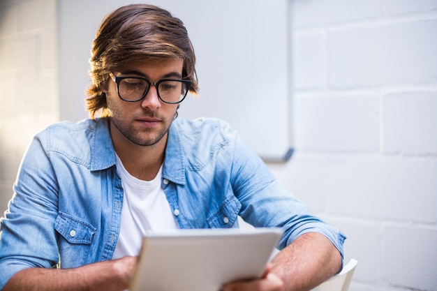 Man using digital tablet