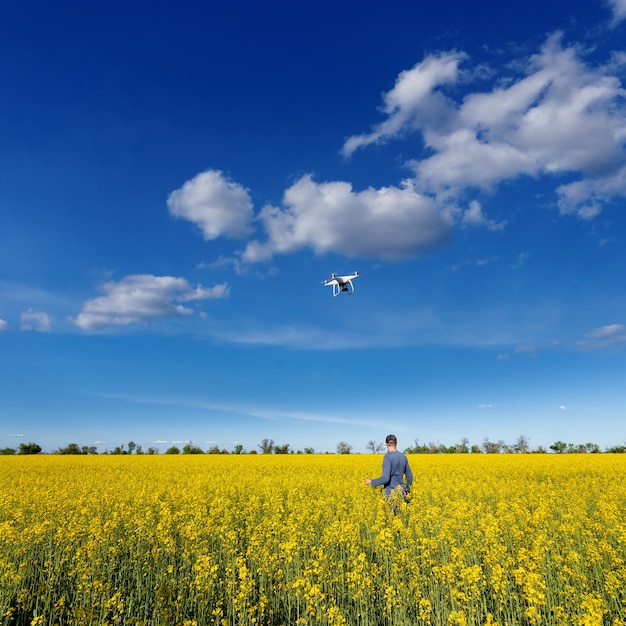 Man using drone in field