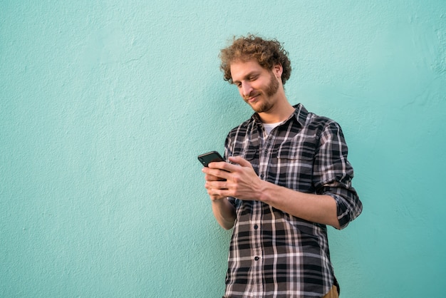 Man using his mobile phone.