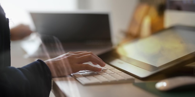 Man using laptop on table