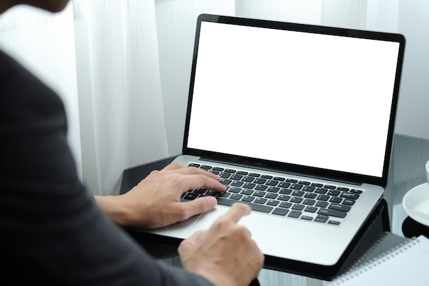 Man using laptop on table