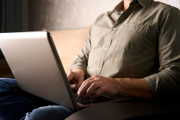 Man using on notebook and working on laptop computer