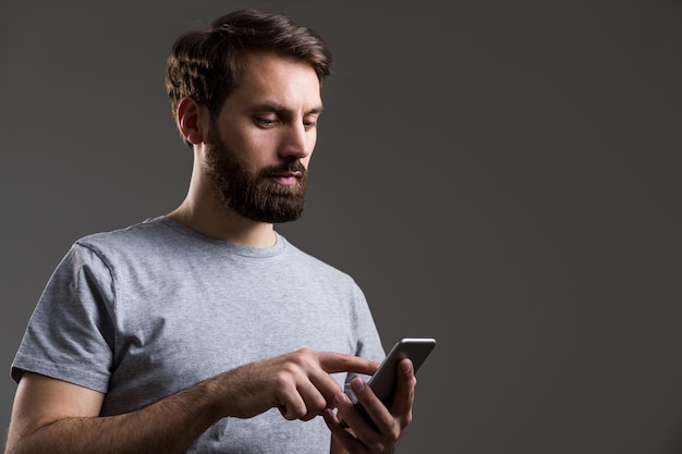 Man using phone dark grey