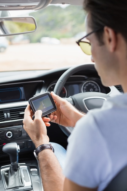 Man using satellite navigation system