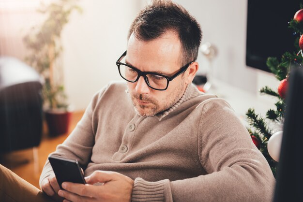 Man using smart phone