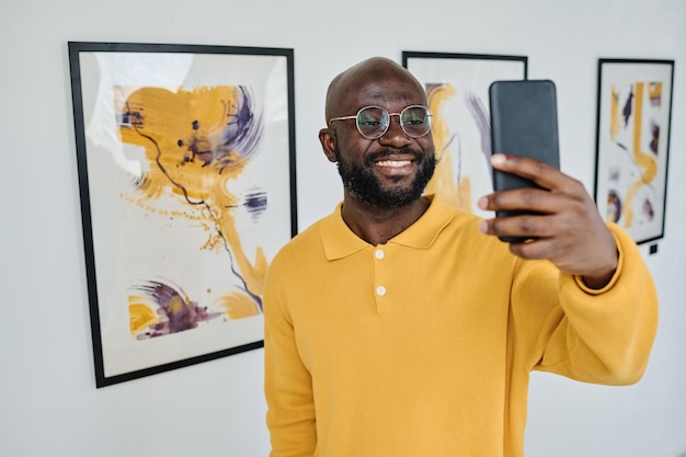 Man using smartphone for streaming