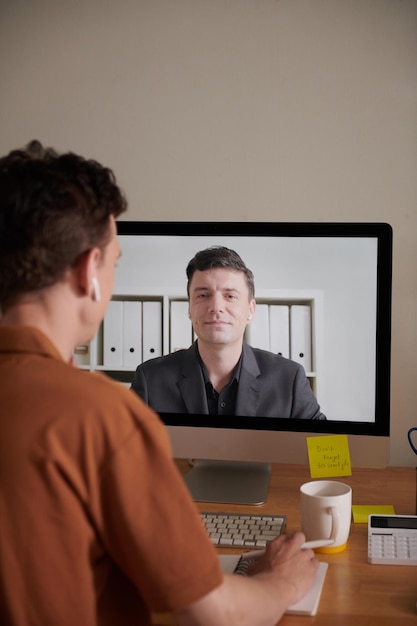 Man Video Calling Project Manager