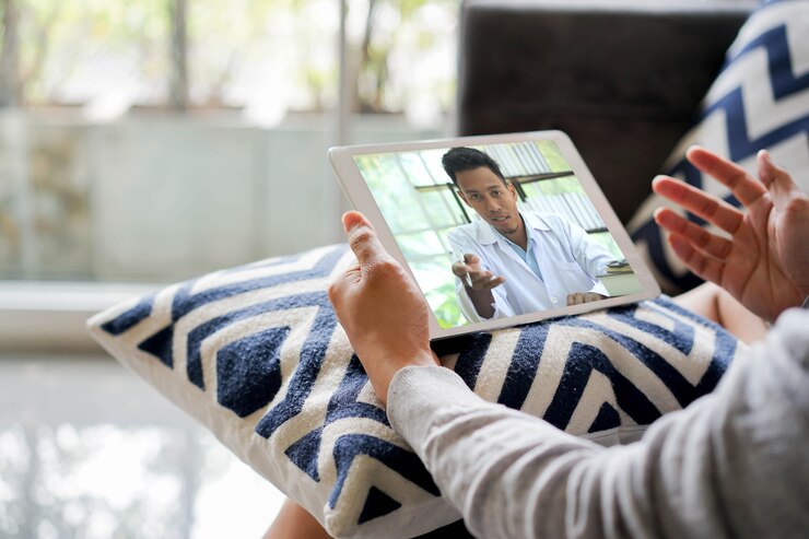 Man video conference to consulting with specialist doctor at home for telemedicine