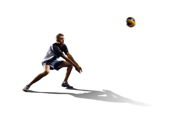 A man in a volleyball uniform with a ball in his hand.