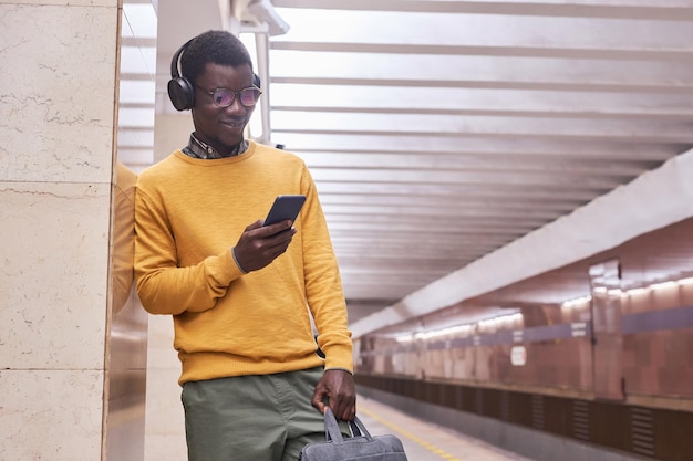 Man waiting for the train in subway