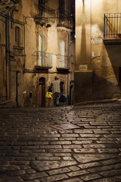 Man walking in alley