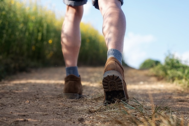 man walking in a field