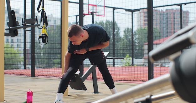 Man warming up before training at sport ground Physical training Healthy lifestyle