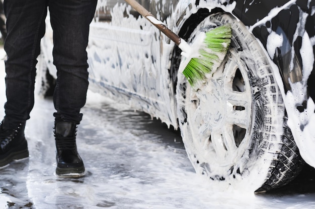 The man washing his car on selfservice car wash express car wash