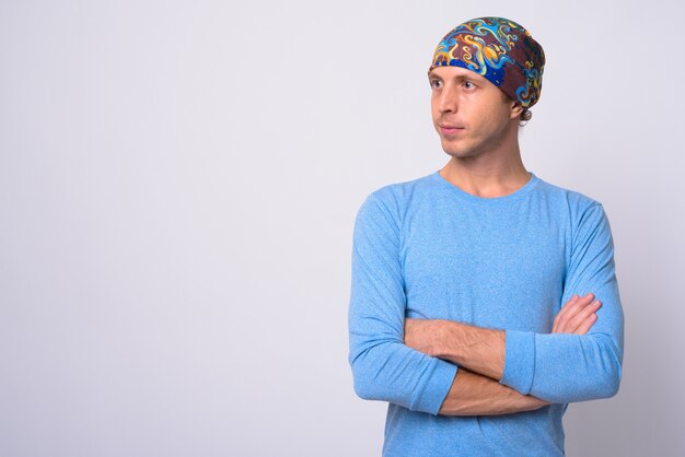 man wearing beanie against white space