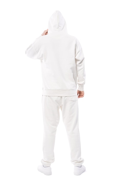 Man wearing blank white hoodie and pants isolated on white background