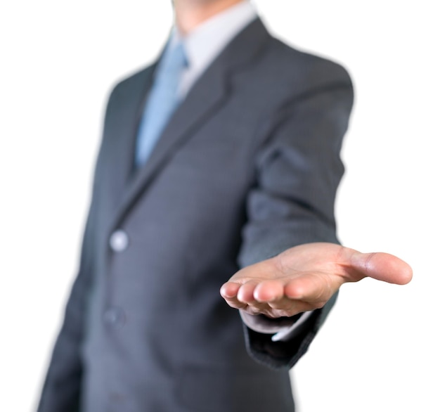 Man wearing a business suit reaching hand out