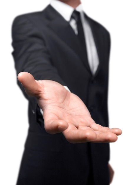 Photo man wearing a business suit reaching hand out