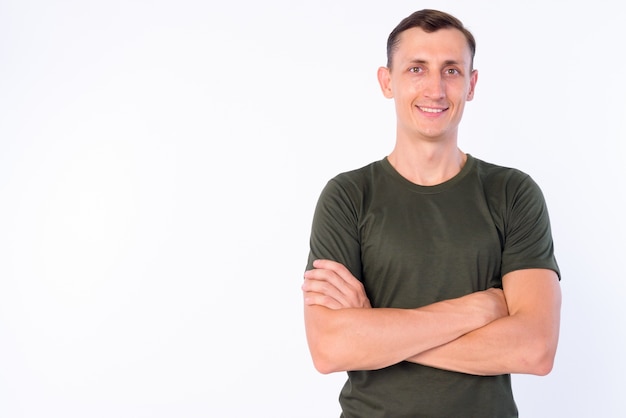 man wearing casual clothing isolated against white wall