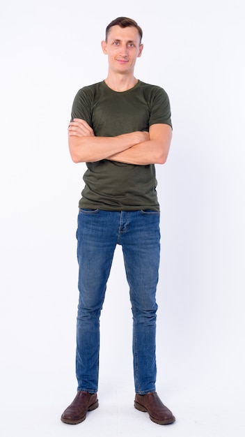 man wearing casual clothing isolated against white wall