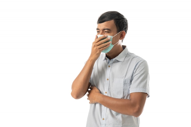 Man wearing face masks and coughing