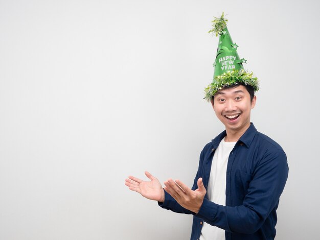 Man wearing green hat happy emotion celebration new year copy space