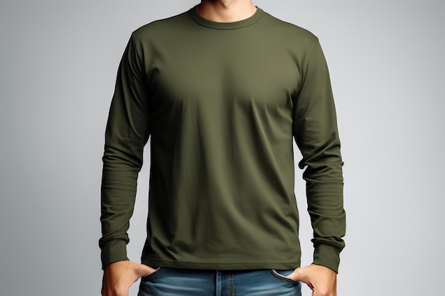 A man wearing a green long sleeved t shirt