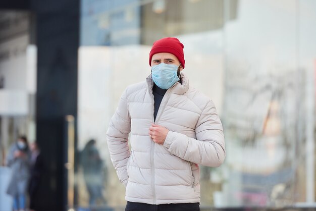 A man wearing a medical face mask to avoid the spread coronavirus (COVID-19).