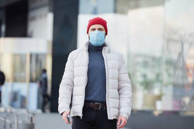 A man wearing a medical face mask to avoid the spread coronavirus (COVID-19).