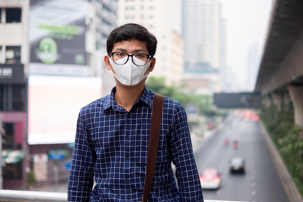 man wearing N95 respiratory mask protect and filter pm2.5 