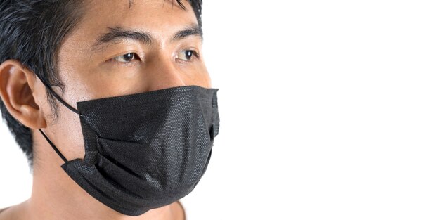 Man wearing protection face mask against coronavirus