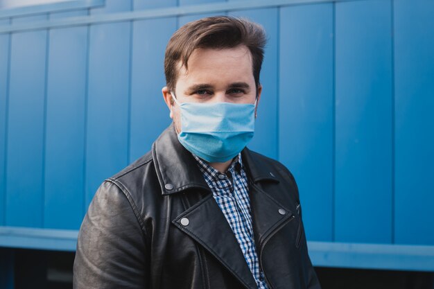 Man wearing protective mask, coronavirus, illness, infection, quarantine, medical mask,