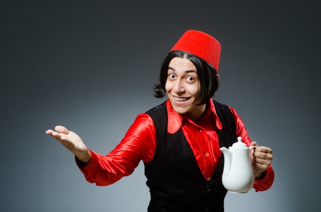 Man wearing red fez hat