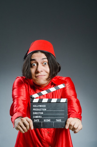 Man wearing red fez hat