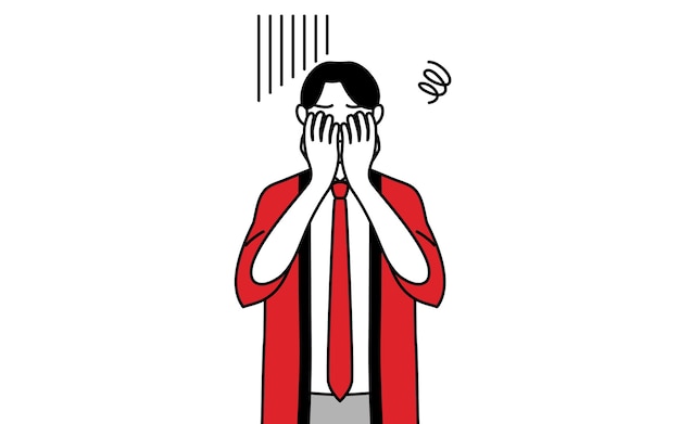 Man wearing a red happi coat covering his face in depression