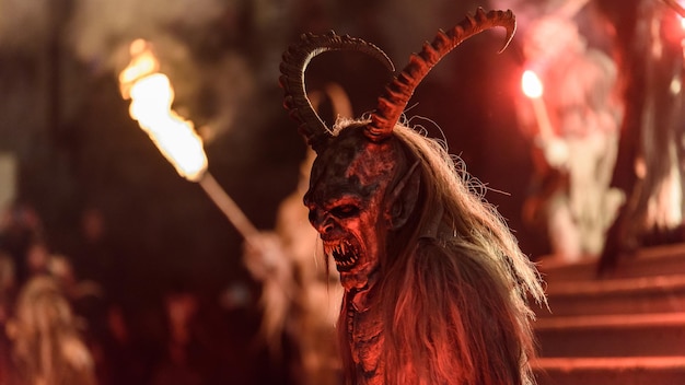 man wearing spooky costume during halloween at night
