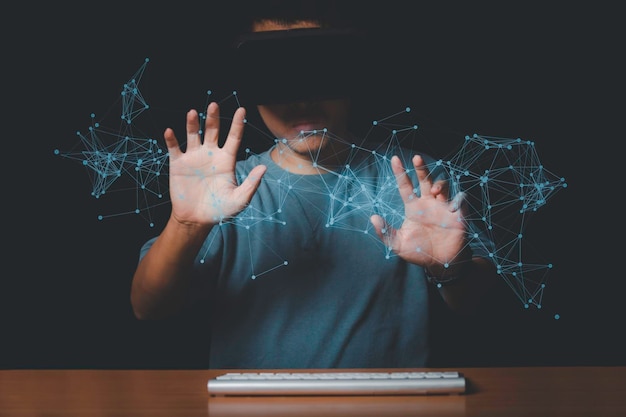 man wearing vr headset network connection line and data exchanges on workplace exploring the metaverse