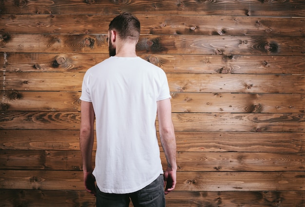 Man wearing white blank t-shirt with space for your logo