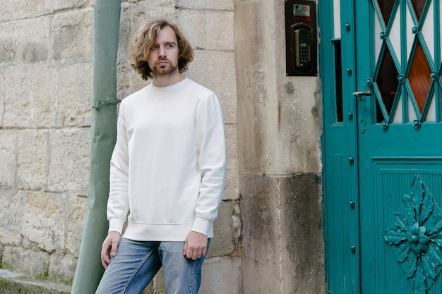 Man wearing white sweatshirt