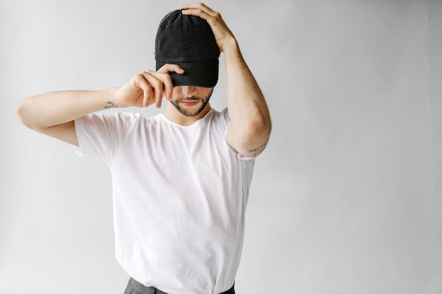 Man wearing a white tee