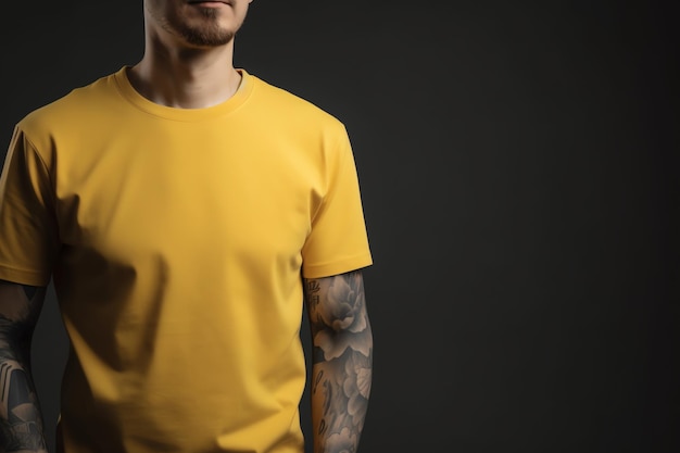 A man wearing a yellow t - shirt with a tattoo on the sleeve.