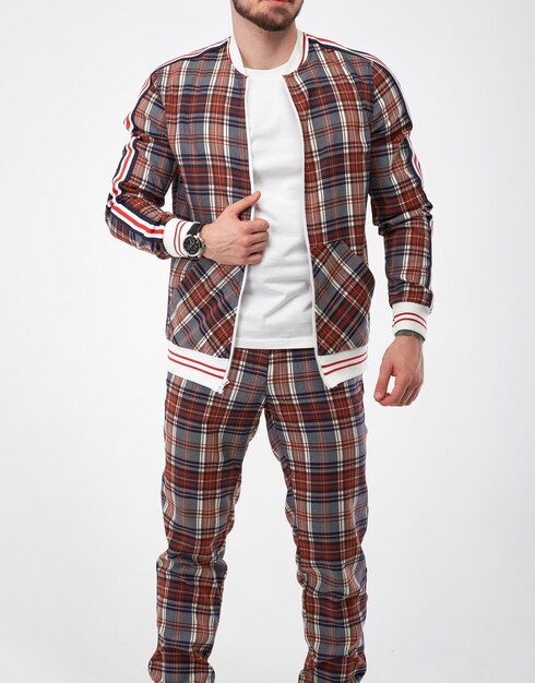 Premium Photo | Man wears checkered tracksuit isolated picture of guy ...