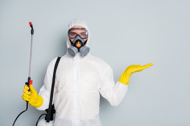 man wears special protective suit and mask