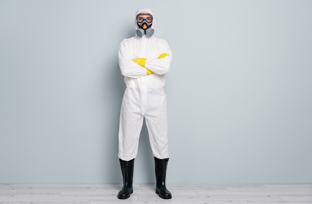 man wears special protective suit and mask