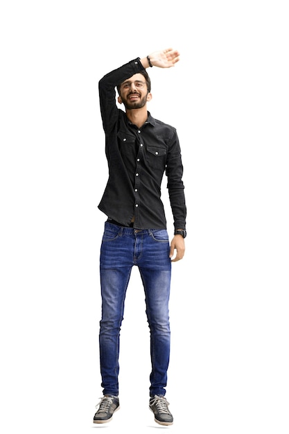 A man on a white background in full height waving his hand