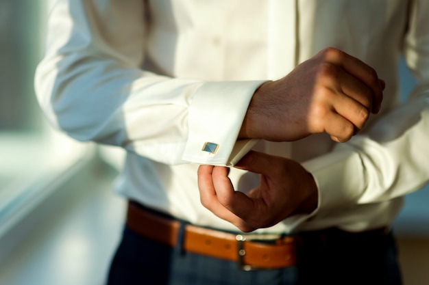 Man in white shirt and cufflink