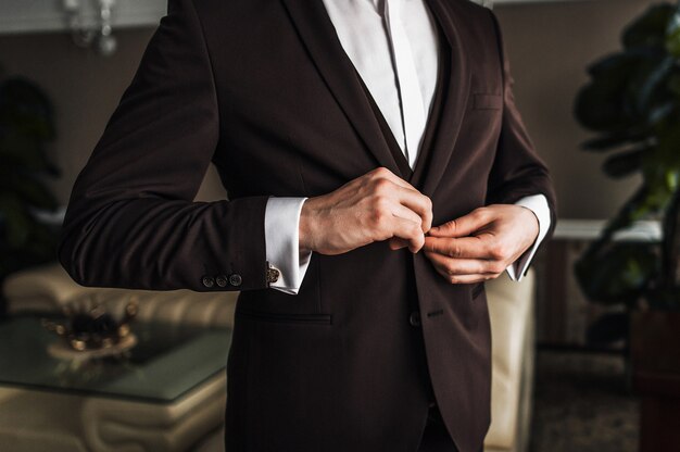 Man in a white shirt and suit