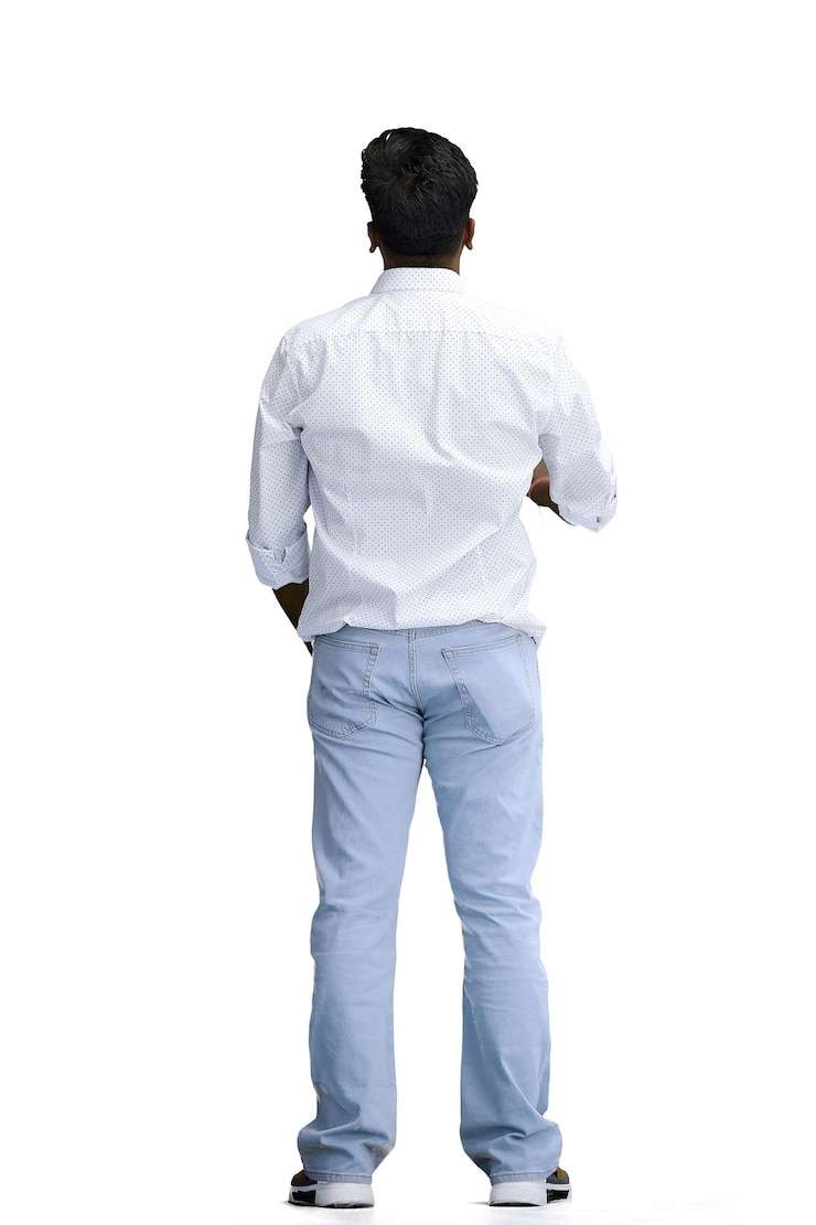 Photo a man in a white shirt on a white background in full height back view