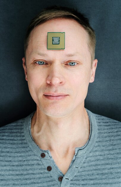 The man wiht a CPU. The processor is on the man's forehead.