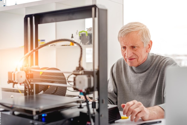 Man with 3D printer